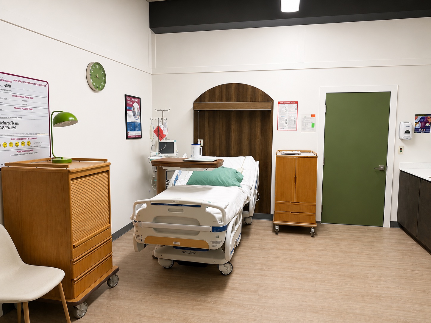 A hospital room standing set with a Stryker hospital bed, IV pole, monitor, and patient care boards at Silver Sail Studios
